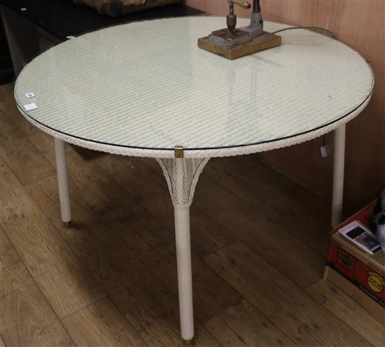 A LLoyd Loom pale green wicker circular topped table W.120cm